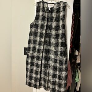 Black and white BCBGeneration long vest size medium